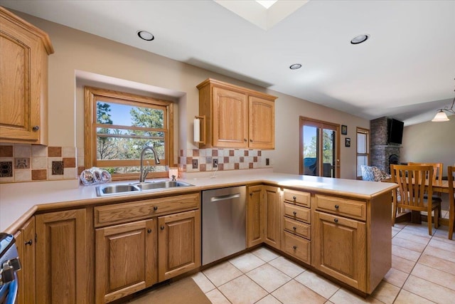 376 Lone Elk Rd, Spearfish, SD 57783 - kitchen with stainless steel dishwasher, a sink, healthy amount of natural light, tasteful backsplash, and recessed lighting