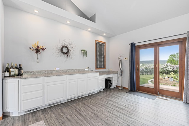 7725 Other, Rapid City, SD 57702 - indoor dry bar with vaulted ceiling, light wood-style flooring, recessed lighting, and baseboards
