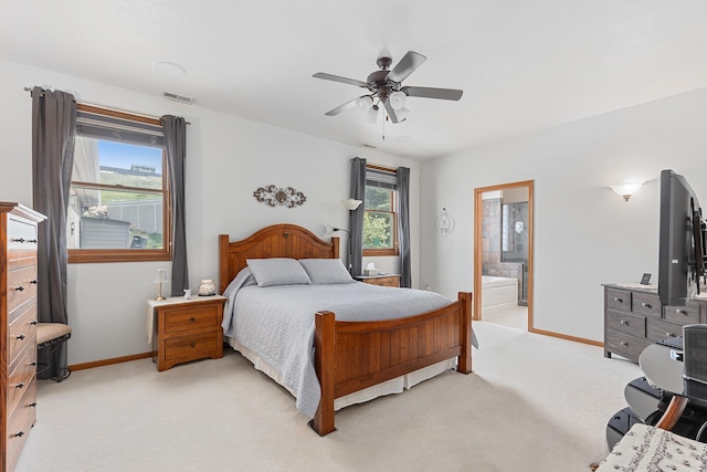 7725 Other, Rapid City, SD 57702 - bedroom featuring multiple windows, light carpet, and baseboards