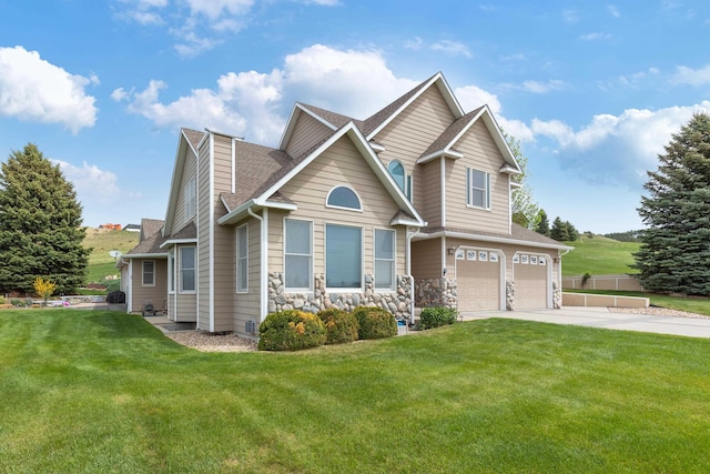 7725 Other, Rapid City, SD 57702 - traditional home featuring a garage, driveway, a front lawn, and roof with shingles