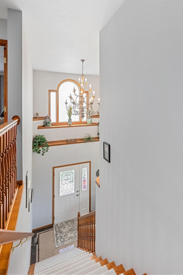 7725 Other, Rapid City, SD 57702 - foyer entrance featuring a chandelier