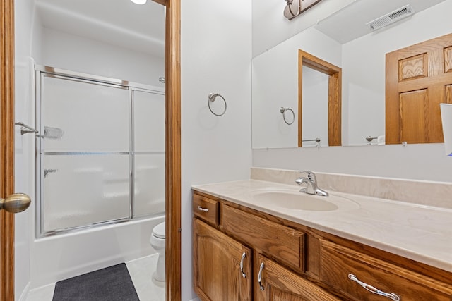 7725 Other, Rapid City, SD 57702 - bathroom with toilet, vanity, combined bath / shower with glass door, and tile patterned floors