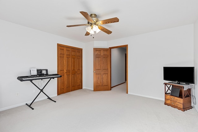 7725 Other, Rapid City, SD 57702 - interior space featuring light carpet, baseboards, a closet, and ceiling fan