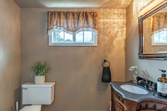 8510 Clarkson Rd, Rapid City, SD 57702 - bathroom with plenty of natural light, vanity, and toilet