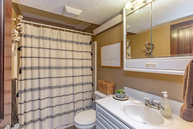 8510 Clarkson Rd, Rapid City, SD 57702 - bathroom with toilet, a textured ceiling, curtained shower, and vanity