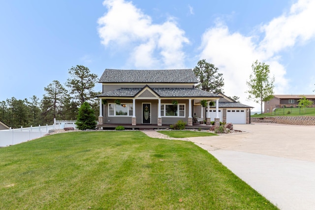 8510 Clarkson Rd, Rapid City, SD 57702 - view of front facade featuring concrete driveway, covered porch, a garage, and roof with shingles