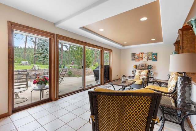 22994 Shields Rd, Rapid City, SD 57702 - living area featuring recessed lighting, a tray ceiling, and light tile patterned floors