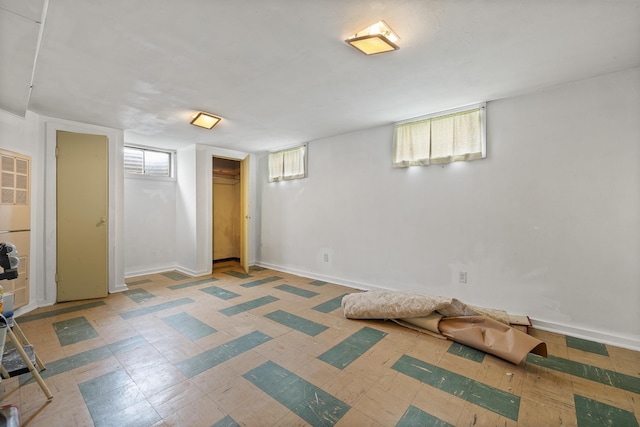 2101 Juniper Dr, Rapid City, SD 57702 - below grade area featuring light floors and baseboards