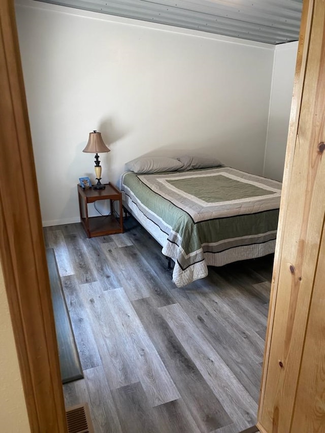 123 Gordon St, Custer, SD 57730 - bedroom featuring wood finished floors