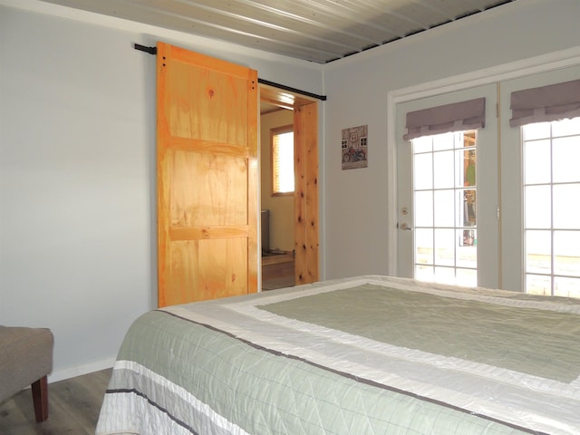 123 Gordon St, Custer, SD 57730 - bedroom with wood finished floors and multiple windows