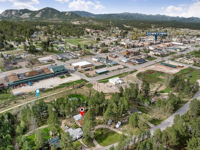 123 Gordon St, Custer, SD 57730 - aerial view of property's location featuring a mountain backdrop and nearby suburban area