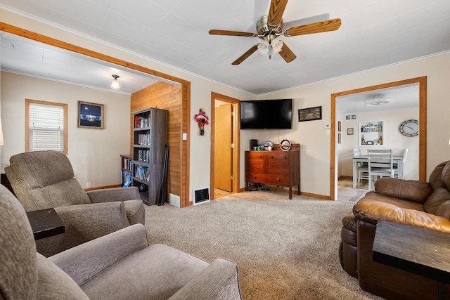123 Gordon St, Custer, SD 57730 - carpeted living area with crown molding, ceiling fan, and baseboards