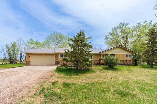 15630 Antelope Creek Rd, Rapid City, SD 57703 - ranch-style home with driveway, an attached garage, a front lawn, board and batten siding, and metal roof