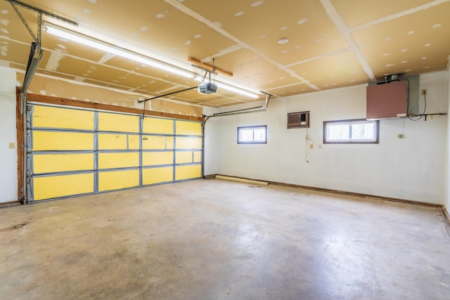 15630 Antelope Creek Rd, Rapid City, SD 57703 - garage featuring a garage door opener and baseboards