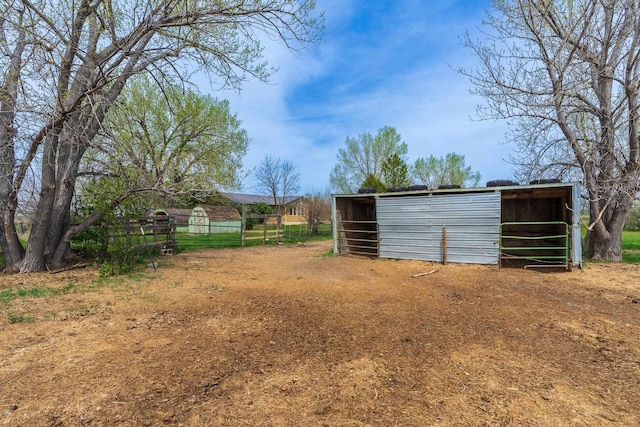 15630 Antelope Creek Rd, Rapid City, SD 57703 - view of yard featuring an outbuilding and fence
