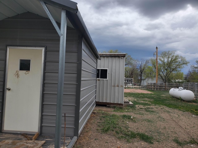 400 5th Ave, Edgemont, SD 57735 - view of outdoor structure featuring fence and an outbuilding