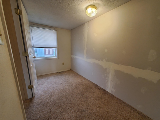 400 5th Ave, Edgemont, SD 57735 - carpeted empty room featuring a textured ceiling