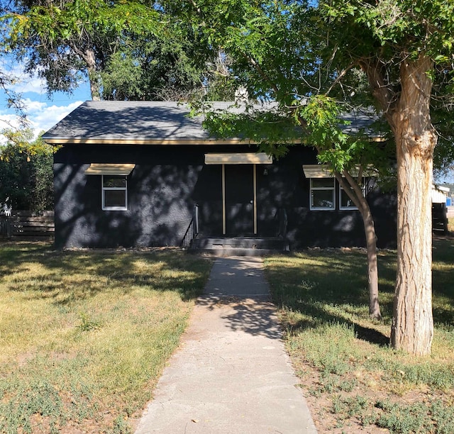 105 N Washington St, Edgemont, SD 57735 - view of front of property with a front lawn
