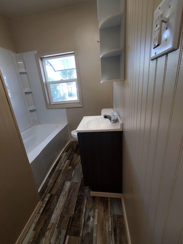 105 N Washington St, Edgemont, SD 57735 - bathroom with wood finished floors, vanity, a tub, toilet, and a shower