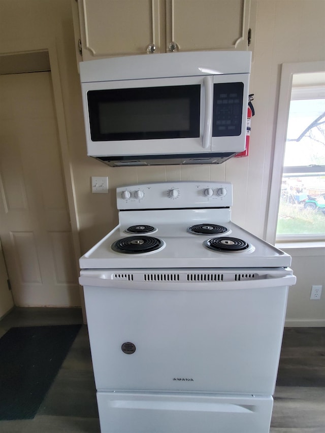 105 N Washington St, Edgemont, SD 57735 - kitchen with white appliances and dark wood-style flooring