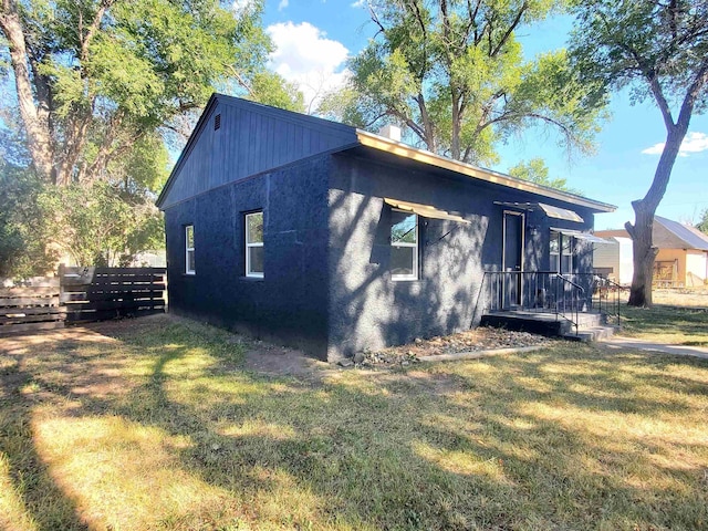 105 N Washington St, Edgemont, SD 57735 - view of home's exterior featuring stucco siding