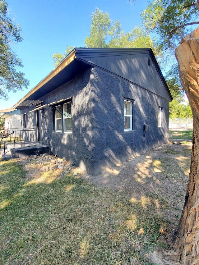 105 N Washington St, Edgemont, SD 57735 - view of home's exterior with a yard