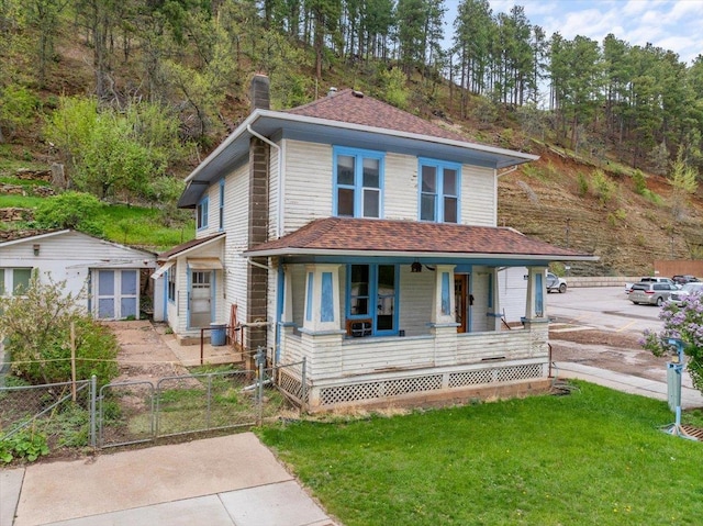 308 Main St, Deadwood, SD 57732 - view of front of property featuring a porch, a gate, a chimney, and a shingled roof