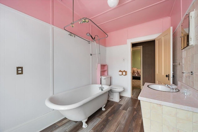 308 Main St, Deadwood, SD 57732 - full bath with a sink, wood finished floors, and toilet