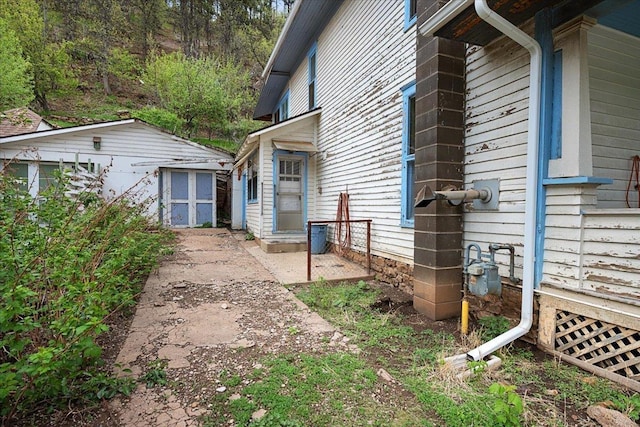 308 Main St, Deadwood, SD 57732 - view of home's exterior with an outdoor structure