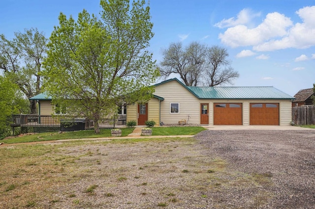 18977 Black Angus Ln, Belle Fourche, SD 57717 - view of front of house featuring driveway and metal roof