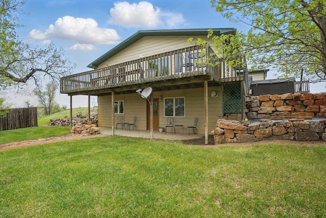 18977 Black Angus Ln, Belle Fourche, SD 57717 - rear view of house featuring a patio area and a deck