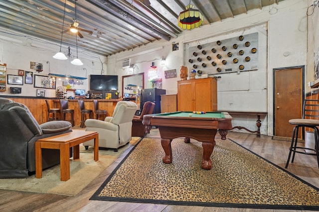 18977 Black Angus Ln, Belle Fourche, SD 57717 - recreation room with hardwood / wood-style floors, billiards table, a dry bar, and a ceiling fan