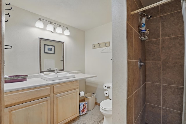 18977 Black Angus Ln, Belle Fourche, SD 57717 - full bathroom with toilet, vanity, and a tile shower