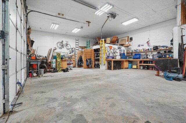 18977 Black Angus Ln, Belle Fourche, SD 57717 - garage featuring a workshop area