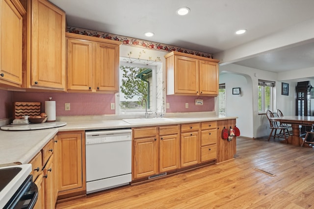 18977 Black Angus Ln, Belle Fourche, SD 57717 - kitchen with white appliances, light countertops, a sink, light wood-type flooring, and recessed lighting