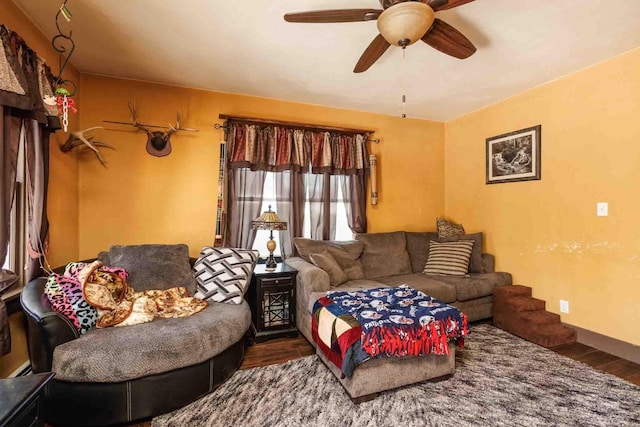1007 Elkhorn St, Belle Fourche, SD 57717 - living area featuring wood finished floors and a ceiling fan