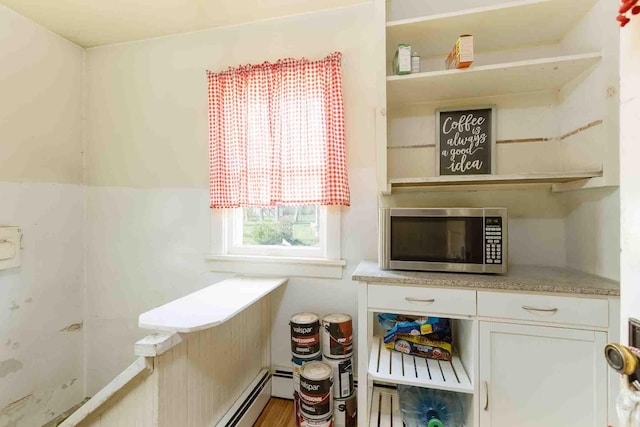 1007 Elkhorn St, Belle Fourche, SD 57717 - interior space with stainless steel microwave