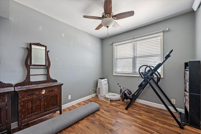 2921 1st Ave, Sturgis, SD 57785 - workout room with ceiling fan, wood finished floors, and baseboards