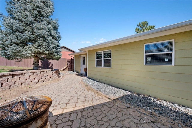 2921 1st Ave, Sturgis, SD 57785 - view of patio featuring fence and a fire pit