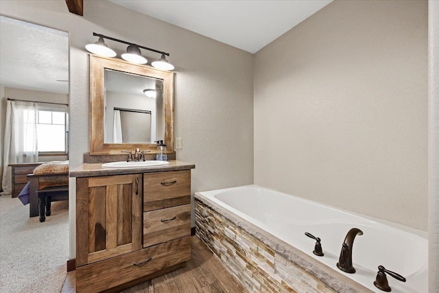 10226 Buena Vista Ln, Belle Fourche, SD 57717 - full bathroom featuring vanity and a garden tub