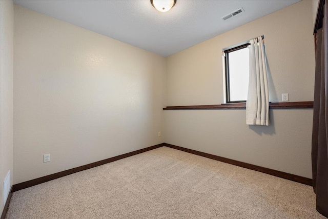10226 Buena Vista Ln, Belle Fourche, SD 57717 - empty room featuring carpet flooring and baseboards