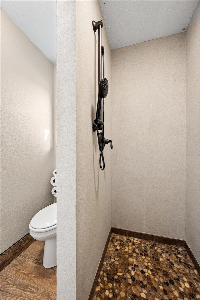 10226 Buena Vista Ln, Belle Fourche, SD 57717 - bathroom with toilet and baseboards