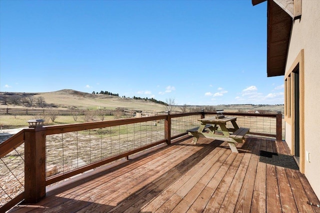 10226 Buena Vista Ln, Belle Fourche, SD 57717 - wooden deck with a view of rural / pastoral area and a mountain view