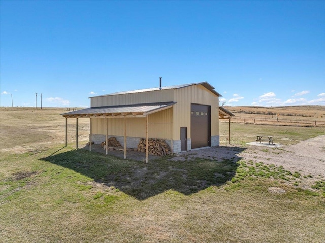 10226 Buena Vista Ln, Belle Fourche, SD 57717 - view of pole building with a yard and a rural view