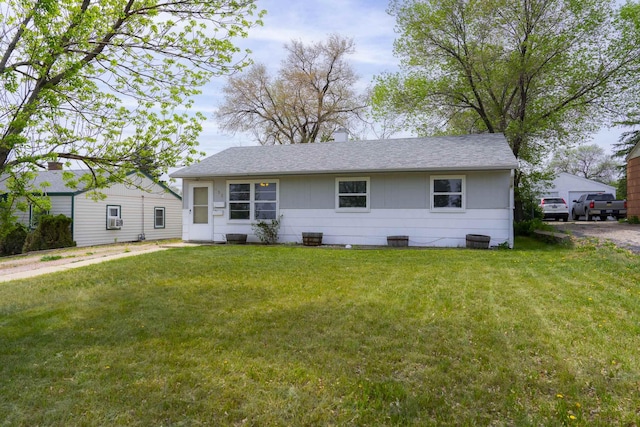 433 E Indiana St, Rapid City, SD 57701 - view of front of home featuring a front lawn and a shingled roof