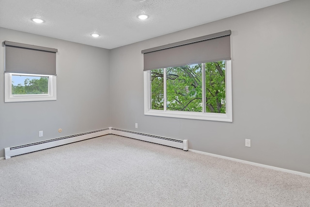 3520 Arizona St, Rapid City, SD 57701 - carpeted empty room with baseboards, recessed lighting, and a textured ceiling