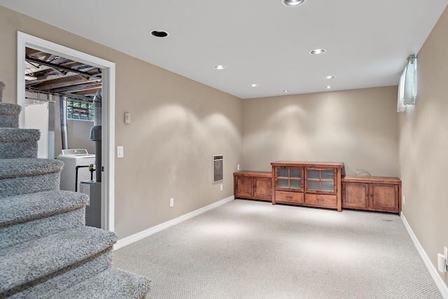 3520 Arizona St, Rapid City, SD 57701 - below grade area featuring washer / dryer, light colored carpet, baseboards, and recessed lighting