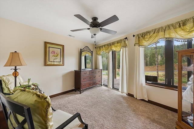 11132 Bogey Cir, Lead, SD 57754 - living area featuring carpet flooring, baseboards, and ceiling fan