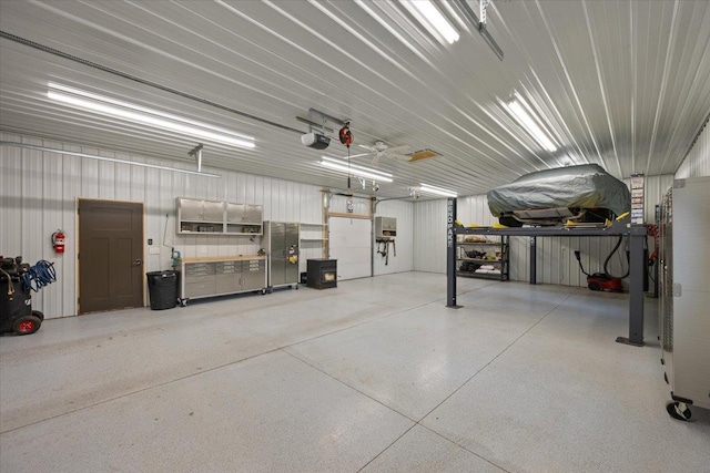 11132 Bogey Cir, Lead, SD 57754 - garage featuring a garage door opener
