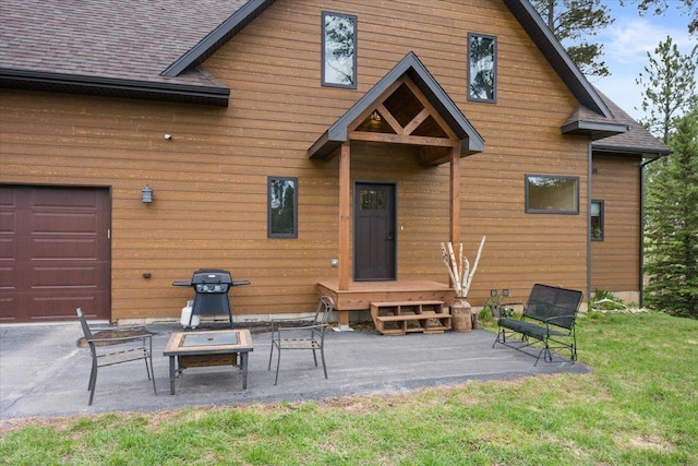 11132 Bogey Cir, Lead, SD 57754 - rear view of property with a shingled roof and a patio